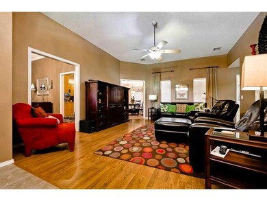 Living Room. This room opens to kitchen & formal dining area and looks out to patio/deck area