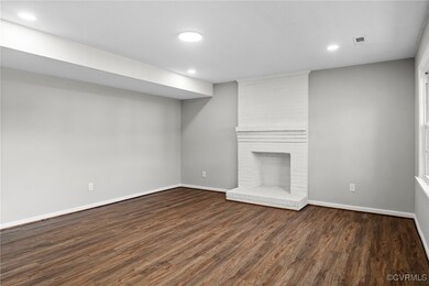 Unfurnished living room featuring a fireplace and