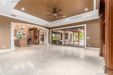 Family room opens up to the gourmet kitchen with c