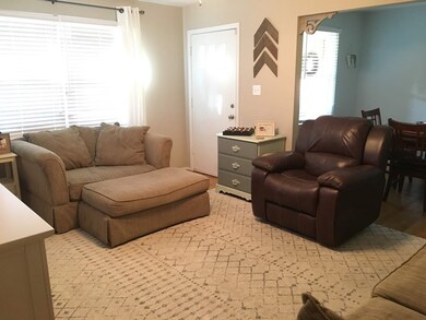 Living Room with Adjoining Dining Room