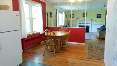 Kitchen opens to dining area