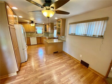 Open dining room and kitchen.