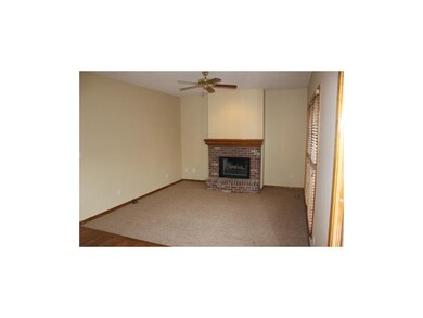 Cozy hearth room just off the kitchen, freshly pai