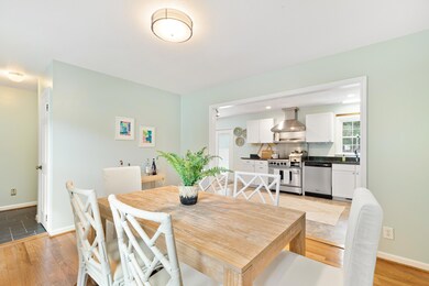 Dining with View of Entry and Kitchen