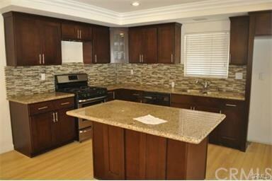 Fantastic upgraded kitchen with granite, rich, dar