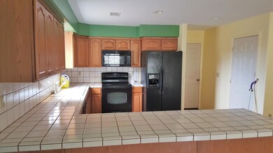 Door to Garage off Kitchen