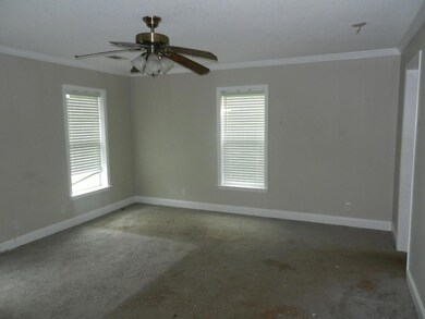 Unfurnished room with a wealth of natural light, c