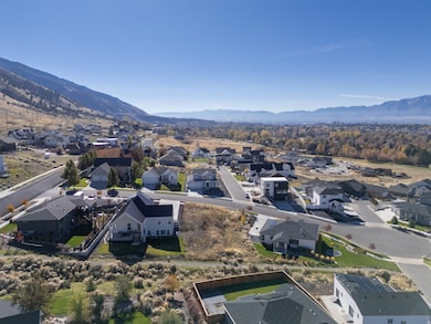 Aerial view of residential area featuring mountains