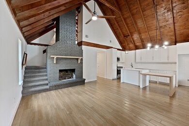 Walk into your open concept kitchen and family roo