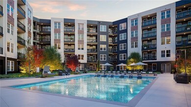 Pool at dusk with a grill