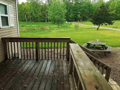 Side deck overlooking rear lot.