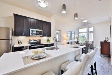 This unit has been renovated and has white quartz