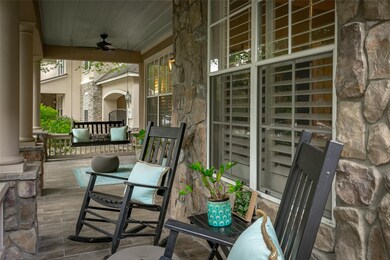 Imagine relaxing on this fabulous front porch with
