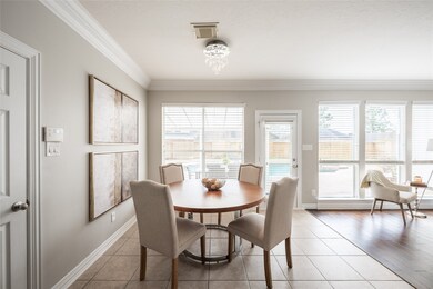 The breakfast room seamlessly connects to the adja