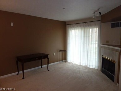 Living room corner ceramic fireplace, track lighti