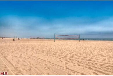 Beach Front Building - Step Out onto the Sand!