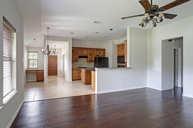 Kitchen featuring black appliances, kitchen penins