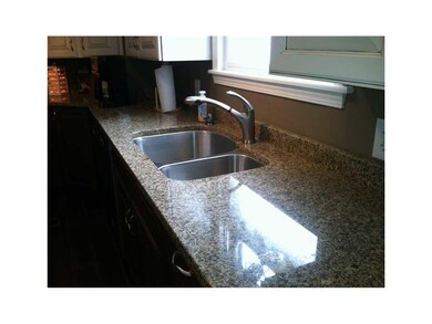 Kitchen. Granite counter tops,  new sink