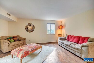 The generously proportioned living room has peacef