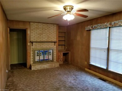 Formal Dining Room with Wood Burning FP & Built In Desk/Shelves
