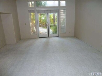 Master bedroom with french doors to patio