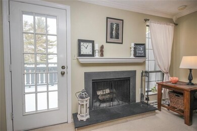 Family room space with fireplace and a door to the