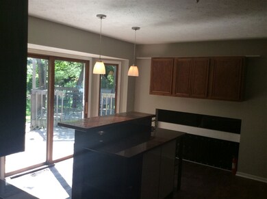Kitchen with wooded view