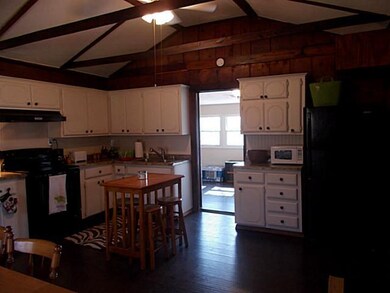 Kitchen. Cabin #1  Kitchen range and refrigerator 