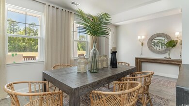 Dining area featuring hardwood / wood-style floori