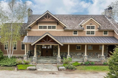 Main Entrance with Oversized Mahogany Doors