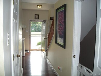 View of foyer from kitchen.  Townhome gets nice li