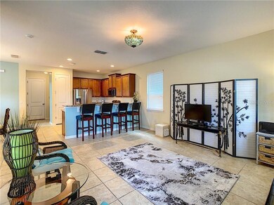 Open concept living room connects the kitchen for 