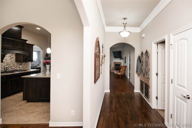 Elegant entrance foyer with beautiful hardwood flo