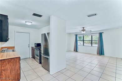 Kitchen with a sink, appliances with stainless ste