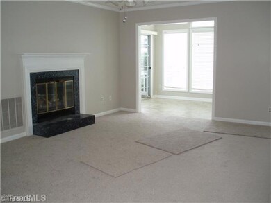 Living Room. Fresh paint and new carpet makes this unit feel like brand new!