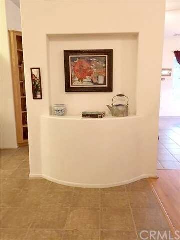 Unique wall display alcove greats you at the entry