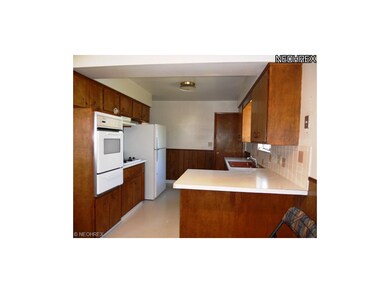 View of Kitchen with Built-in Oven, Counter-Top Ga