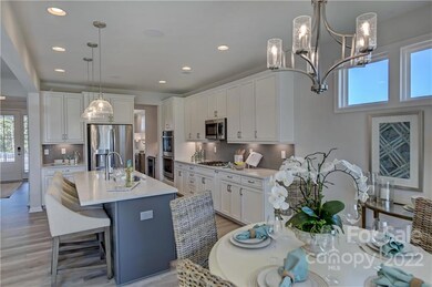 REPRESENTATIVE PHOTOS.  Plenty of space for casual meals or entertaining