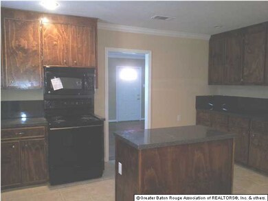 View of Kitchen with lots of cabinets and counter 