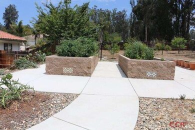 Beautiful raised beds - no gophers here!  Tiles sp