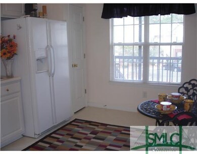 Kitchen. Large, bright!   Refrigator can stay.  Al