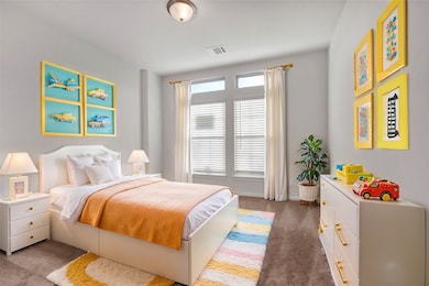 Virtually staged as a cozy kids’ room, this versat