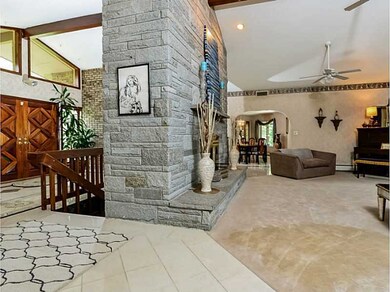 Living Room. Stunning 12 1/2  stone fireplace.