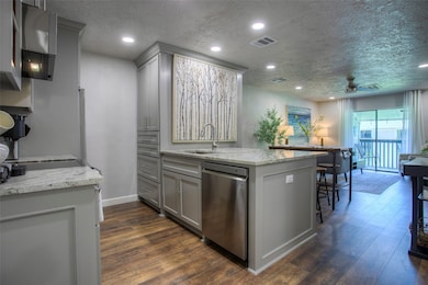 The kitchen is open to the living and dining areas