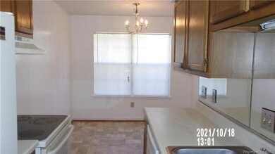 Galley-style kitchen with breakfast nook