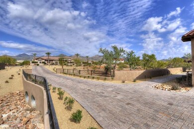 Long private driveway to four car garage