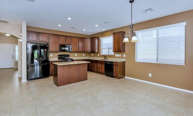 Rich cabinetry & granite