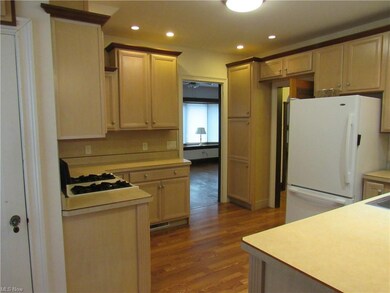Remodeled kitchen with 2 toned cabinetry. All appl