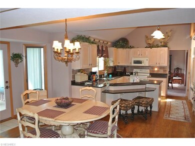 Spacious Kitchen with Hardwood Floors, Granite, Su