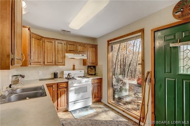 Large window & stained glass entry door!